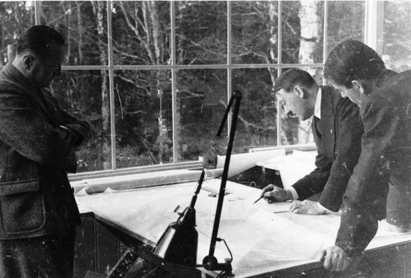 Adolf Hitler with architects Hermann Giesler and Albert Speer working on architectural plans in Bechstein house on the Obersalzberg 